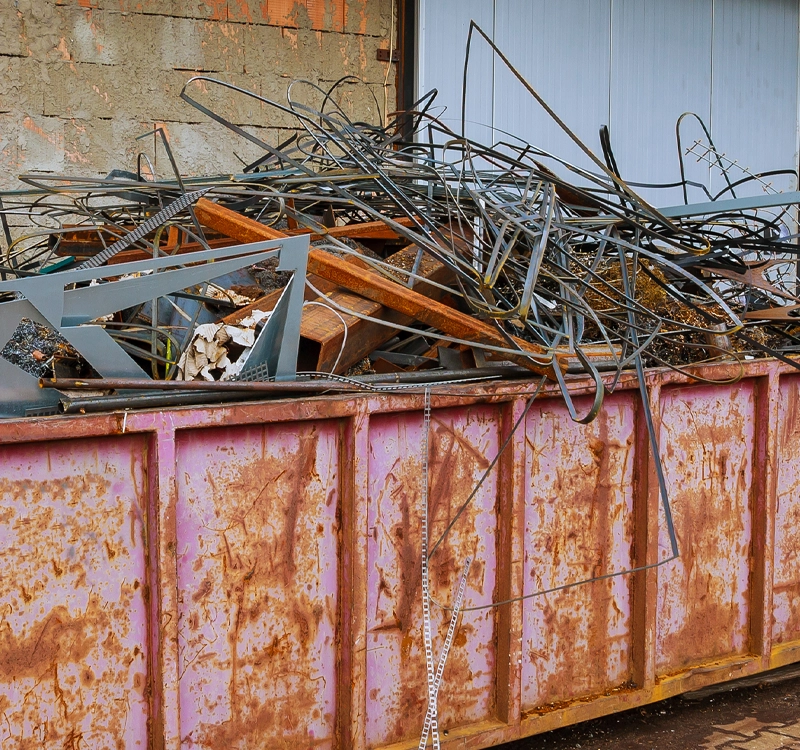 River City Steel & Recycling roll off container at job site