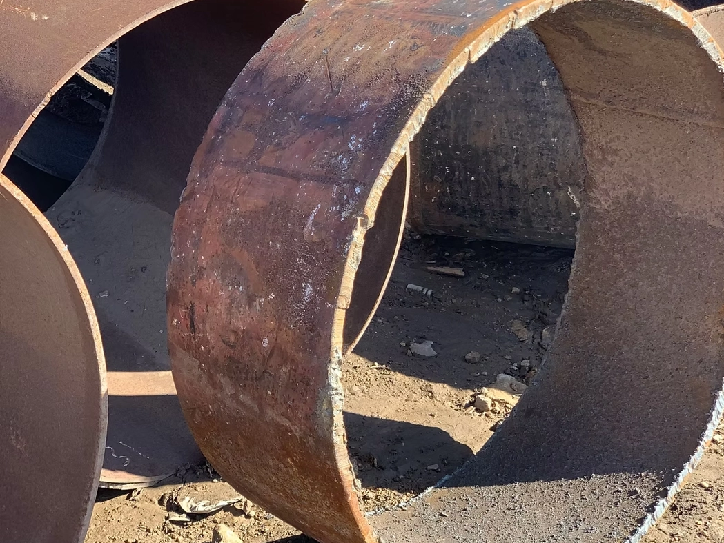 Surplus steel yard in San Antonio with structural steel and pipe